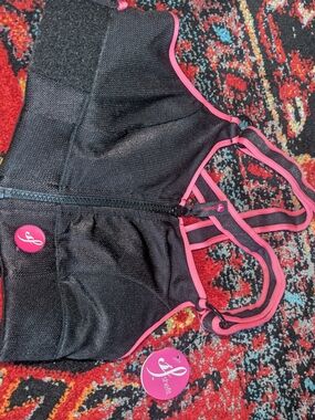 SHEFIT Black One-Piece with Pink Trim and Strappy Back